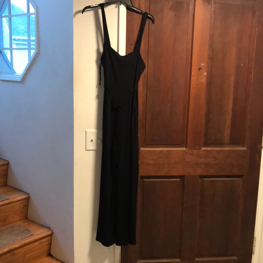 Black jumpsuit by forever 21, Never worn has tags on.